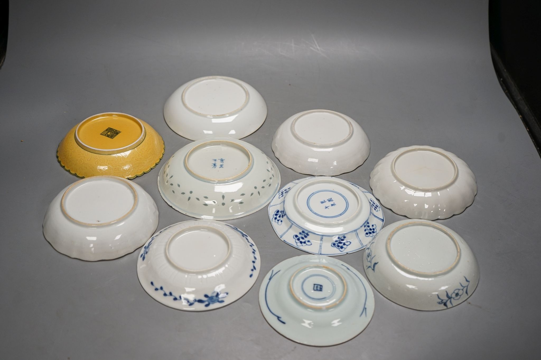Ten various Chinese porcelain saucer dishes, largest 15cm